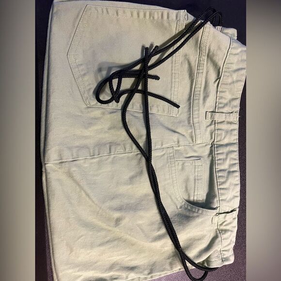 Multi purpose green denim waist bag with front, side and back pockets - Picture 9 of 12